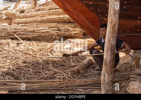 Dhow in construction in shipyard at the Ayjah harbour in Sur, Sultanate of Oman, Stock Photo