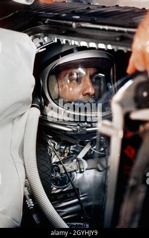 (29 April 1961) --- A close-up of astronaut Alan B. Shepard Jr. in his space suit with his helmet on inside the Mercury capsule. He is undergoing a flight simulation test with the capsule mated to the Redstone booster. This will be the first attempt to put a man into space by the U.S. aboard a Mercury spacecraft, launched atop a Redstone rocket. The suborbital trajectory will be down the Atlantic Missile Range Stock Photo