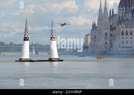 Airplane against Hungarian Parliament. Red Bull Air Race in Budapest, 24 june 2018 Stock Photo