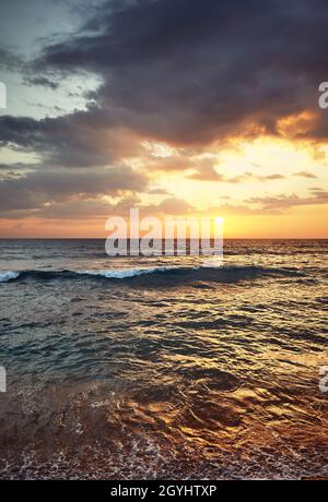 Scenic golden sunset over the sea. Stock Photo
