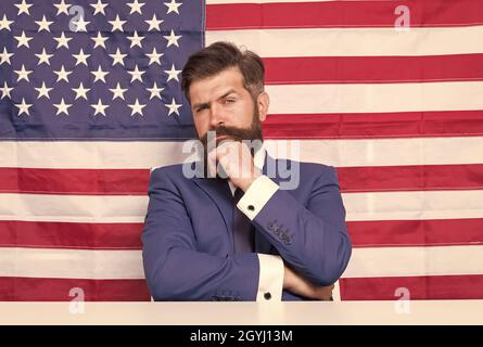 Man american presenter anchorman in studio, promoting elections concept Stock Photo