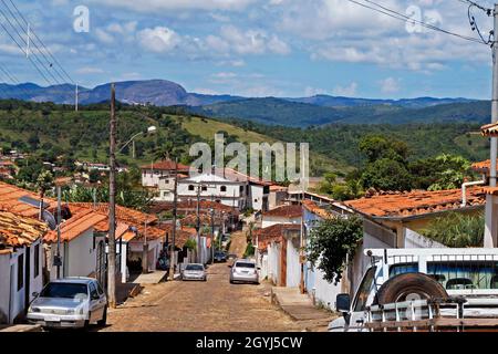 SERRO, MINAS GERAIS, BRAZIL - JANUARY 21, 2019: Typical street in historical city and the countryside in the background Stock Photo