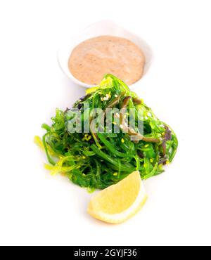 Japanese Cuisine - Chuka Seaweed Salad. Served with Nuts Sauce and Sesame. Stock Photo