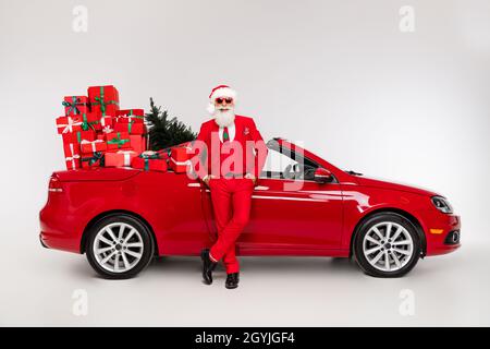 Photo of santa claus old grandpa hands pockets loaded car present delivery concept isolated on white color background Stock Photo