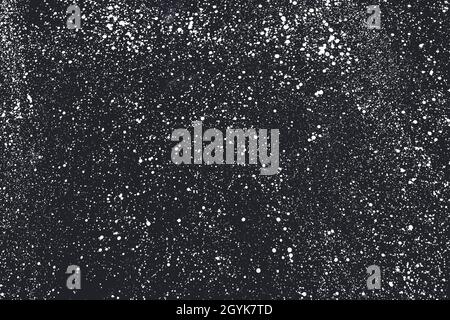 Abstract monochrome dotted background with paint brush white ink splashes and stains on black. Isolated design, art layer overlay with space for text Stock Photo