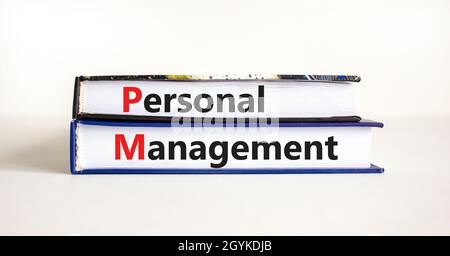 Personal management symbol. Concept words 'Personal management' on books on a beautiful white table, white background. Business and personal managemen Stock Photo