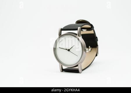 men's watch with a white dial. without numbers. isolated background. Stock Photo