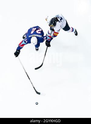 Republic of Korea’s Kim Hee-won (right) and Iceland’s Katrin Bjornsdottir battle for the puck during the Beijing 2022 Olympics Women's Pre-Qualification Round Two Group F match at the Motorpoint Arena, Nottingham. Stock Photo