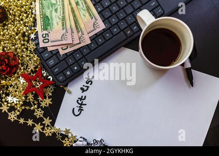 BUCHAREST, ROMANIA - Sep 01, 2021: The Christmas gifts concept on black table in Bucharest, Romania, 2021 Stock Photo