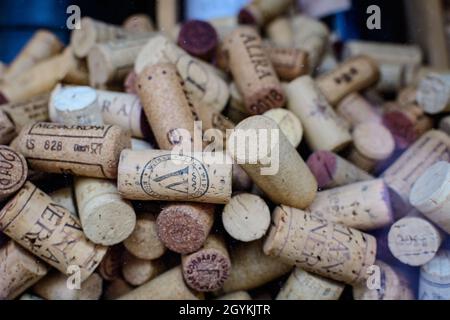 Bucharest, Romania, 27 March 2021: Bowl full of many used wine corks from a variety of wineries Stock Photo
