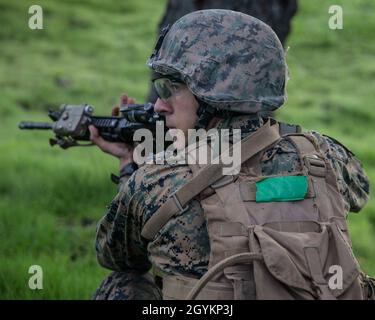 A student at Infantry Training Battalion buddy carries another during ...