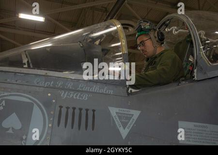 Marine Sgt. Emanuel Goldsmith performs function checks on an AV-8B Harrier II during cold weather training at Naval Air Station Fallon, Nevada, January 24, 2020. Marine Attack Squadron 231 participates in cold weather training to better prepare the unit for colder climates while maintaining combat efficiency. Goldsmith is an aircraft electrical systems technician with VMA-231. (U.S. Marine Corps photo by Lance Cpl. Steven Walls) Stock Photo