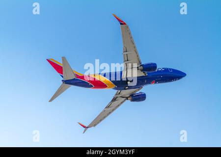 Santa Ana, CA, USA – August 12, 2021: Southwest Airlines Boeing 737 aircraft is airborne as it departs John Wayne Airport in the Orange County city of Stock Photo