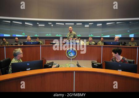 U.S. Navy Adm. Charles “Chas” Richard, commander of U.S. Strategic Command (USSTRATCOM), speaks to his key staff on the battle deck of USSTRATCOM’s command and control facility (C2F) during Exercise Global Lightning 20 at Offutt Air Force Base, Neb., Jan. 30, 2020. Global Lightning is an annual command and control exercise that employs global operations in coordination with other combatant commands, services, U.S. government agencies, and allies to deter, detect and, if necessary, defeat strategic attacks against the United States and its allies. This is the first major exercise USSTRATCOM con Stock Photo