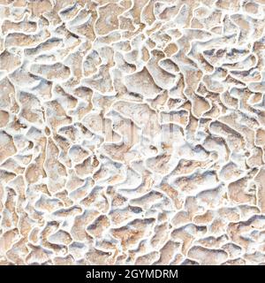 Seamless texture of Pamukkale calcium travertine in Turkey, uneven pattern of cells. Stock Photo