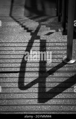 Closeup photos of objects casting shadows and creating mysteries in black and white. Stock Photo