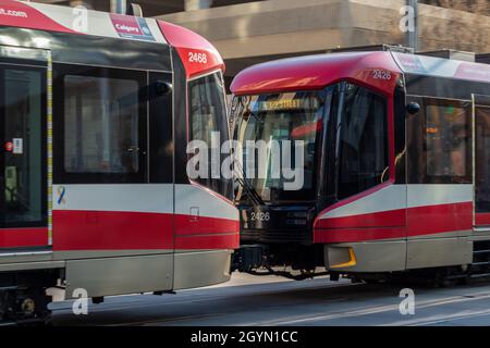 April 12, 2021 - Closeup Calgary Transit CTrain passing through downtown Calgary Stock Photo