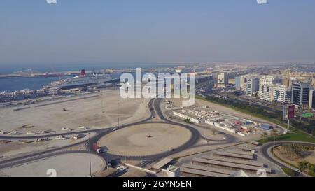 Highway on Dubai. Aerial view of The World Islands in Dubai. The islands were intended to be developed with hotel complexes and luxury villas, like Th Stock Photo