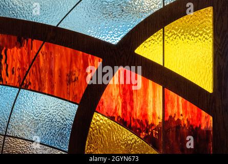 Embossed painted glass with metal separated sections. Geometric shapes with colored glass Stock Photo