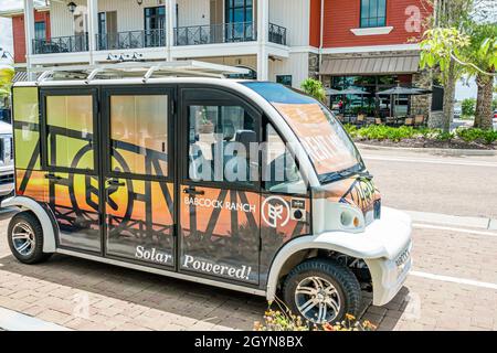 Babcock Ranch Florida,planned community first solar-powered city,clean renewable energy,solar-powered air-conditioned all-electric golf cart rental Stock Photo