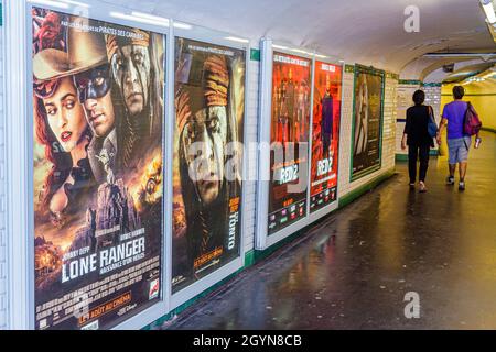 Paris France,18th arrondissement,Montmatre,Anvers Sacre Coeur Metro Station Line 2 subway,billboard ads advertising movie posters Lone Ranger Stock Photo