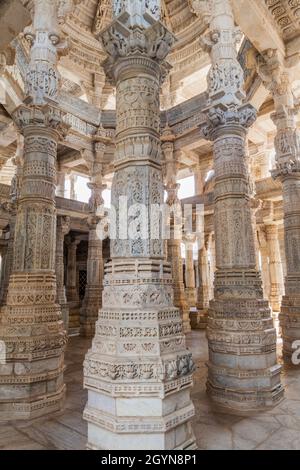 RANAKPUR, INDIA - FEBRUARY 13, 2017: Decorated marble interior of Jain temple at Ranakpur, Rajasthan state, India Stock Photo