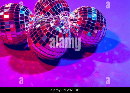 Shiny disco balls with small mirror mosaic. Closeup on spherical  discotheque glitterballs Stock Photo - Alamy
