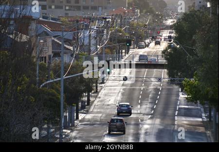 Empty and quiet Johnston Street in inner Melbourne suburb of Collingwood during COVID-19 pandemic lockdown Stock Photo