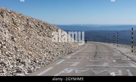 Lone cyclist climbing to the summit Mont Ventoux Stock Photo