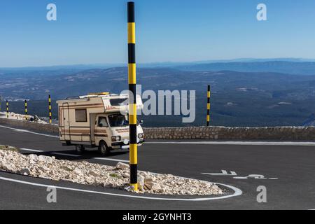 Old motor home completes the drive to the top of Mont Ventoux Stock Photo
