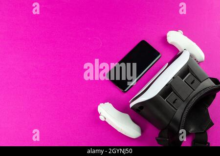 VR Headset on color table background Stock Photo