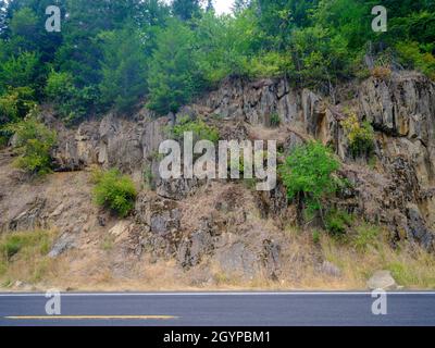 The rocky cliffs along the road in eastern Idaho, USA Stock Photo