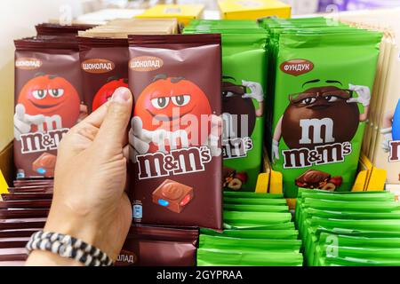 Volzhsky, Russia-September 21, 2021: Milk chocolate m and ms made by Mars Inc. Selective focus Stock Photo