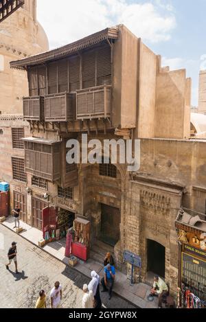 Cairo, Egypt- September 25 2021: Facade of Ayyubid era Mosque and School of Sultan Al Kamel, Muizz Street, Gamalia District