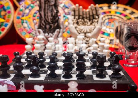 Traditional handcrafted Mexican souvenirs and chess for sale at marketplace Stock Photo