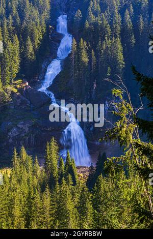 The Krimml Waterfalls (German: Krimmler Wasserfälle), with a total height of 380 metres (1,247 feet), are the highest waterfall in Austria. The falls Stock Photo
