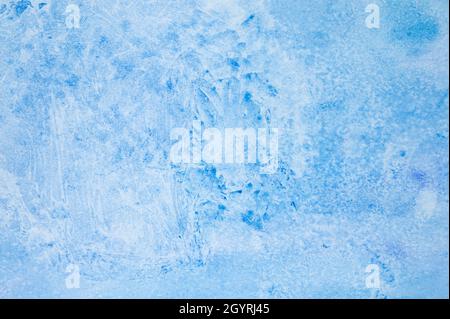 watercolor blue abstract art handmade diy painting on textured paper background. watercolour backdrop. painted frosty ice cold surface with broken lin Stock Photo