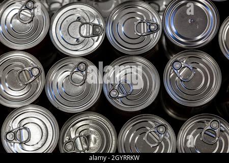 A full frame photograph looking down on tins of food Stock Photo