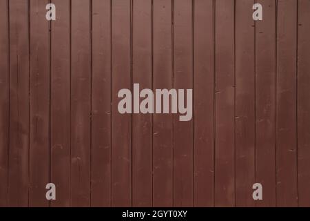 Reddish brown colored rustic wooden planks wall backdrop texture Stock Photo
