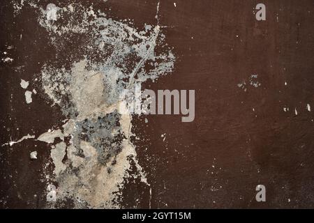 Old brown painted cracked wall grunge texture detail Stock Photo