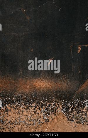 Black plastered wall with damp and mould, grunge background or texture Stock Photo