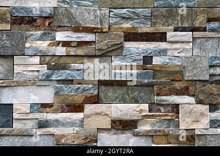 Rustic stone mosaic wall facing ceramic porcelain tiles stonewear Stock Photo