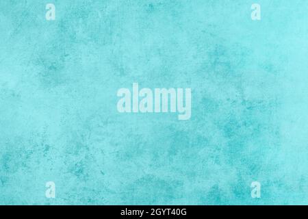 Worn out textured aquamarine colored grunge background Stock Photo