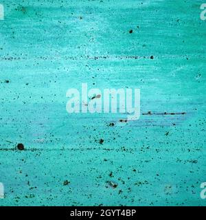 Aquamarine painted rusted metal sheet, grunge background or texture Stock Photo
