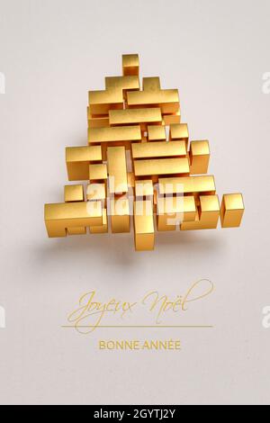 Christmas tree made from golden tetris style blocks on a paper background. French Message 'Joyeux Noël / Bonne Année' (Merry Christmas / Happy New Yea Stock Photo
