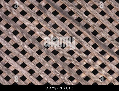 detail of an old and deteriorated wooden lattice Stock Photo