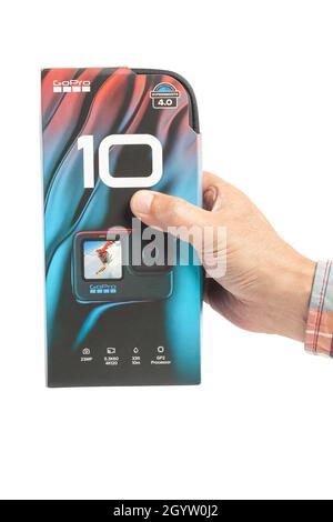 Moscow, Russia, October 09,2021 GoPro HERO10 Black Edition on white background hold in hand Stock Photo