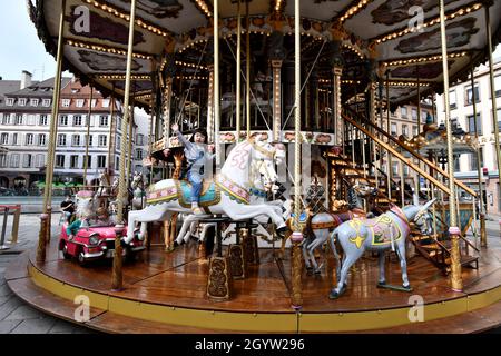 The old 1900s carousel Johannes Gutenberg square in Strasbourg, France ...