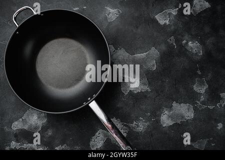 Modern non stick surface frying pan, skillet or sauce pan set with copy space for text or food with copy space for text or food, top view flat lay, on Stock Photo