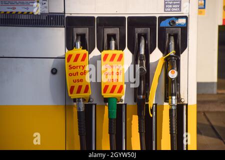 London, UK. 09th Oct, 2021. 'Sorry, Out Of Use' signs cover the fuel pumps at a Shell petrol station in Islington, as the fuel shortage continues in London. Credit: SOPA Images Limited/Alamy Live News Stock Photo